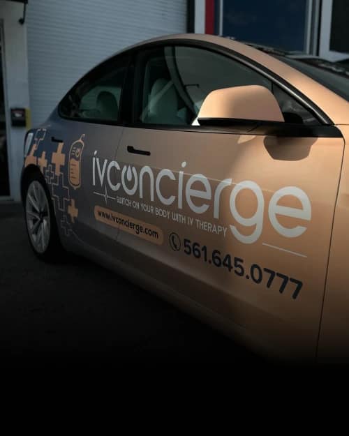 Perforated window graphics on delivery van Miami