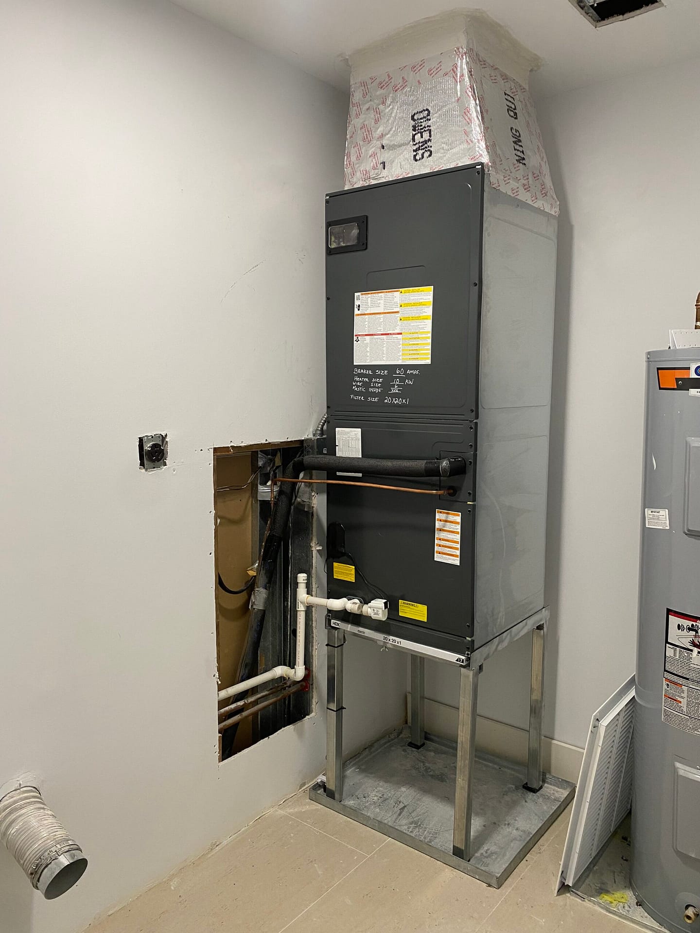 Ductless mini split indoor air handler mounted on wall